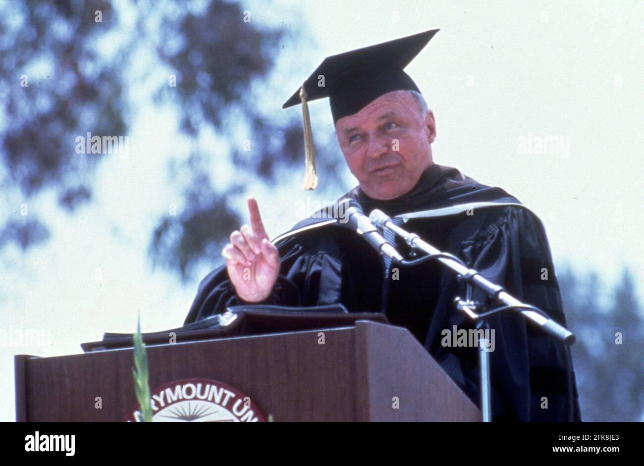 Frank Sinatra receives honorary doctorate degree during Loyola Marymount University Graduation Ceremony at Loyola Marymount University in Los Angeles, California, United States. May 24, 1984. Credit: Ralph Dominguez/MediaPunch Credit: Ralph Dominguez/MediaPunch Stock Photo