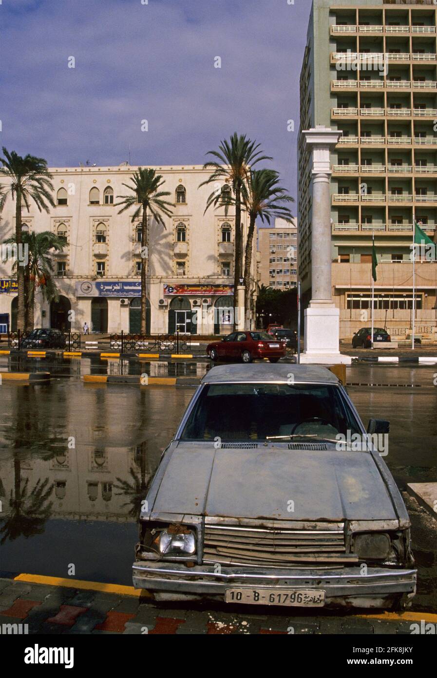andoned car on a boulevard of Benghazi, Cyrenaica, Libya Stock Photo