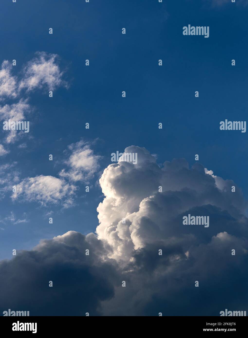 The blue sky with fluffy clouds Stock Photo - Alamy
