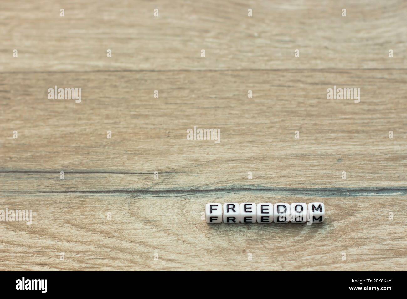 Freedom letter cubes Stock Photo - Alamy