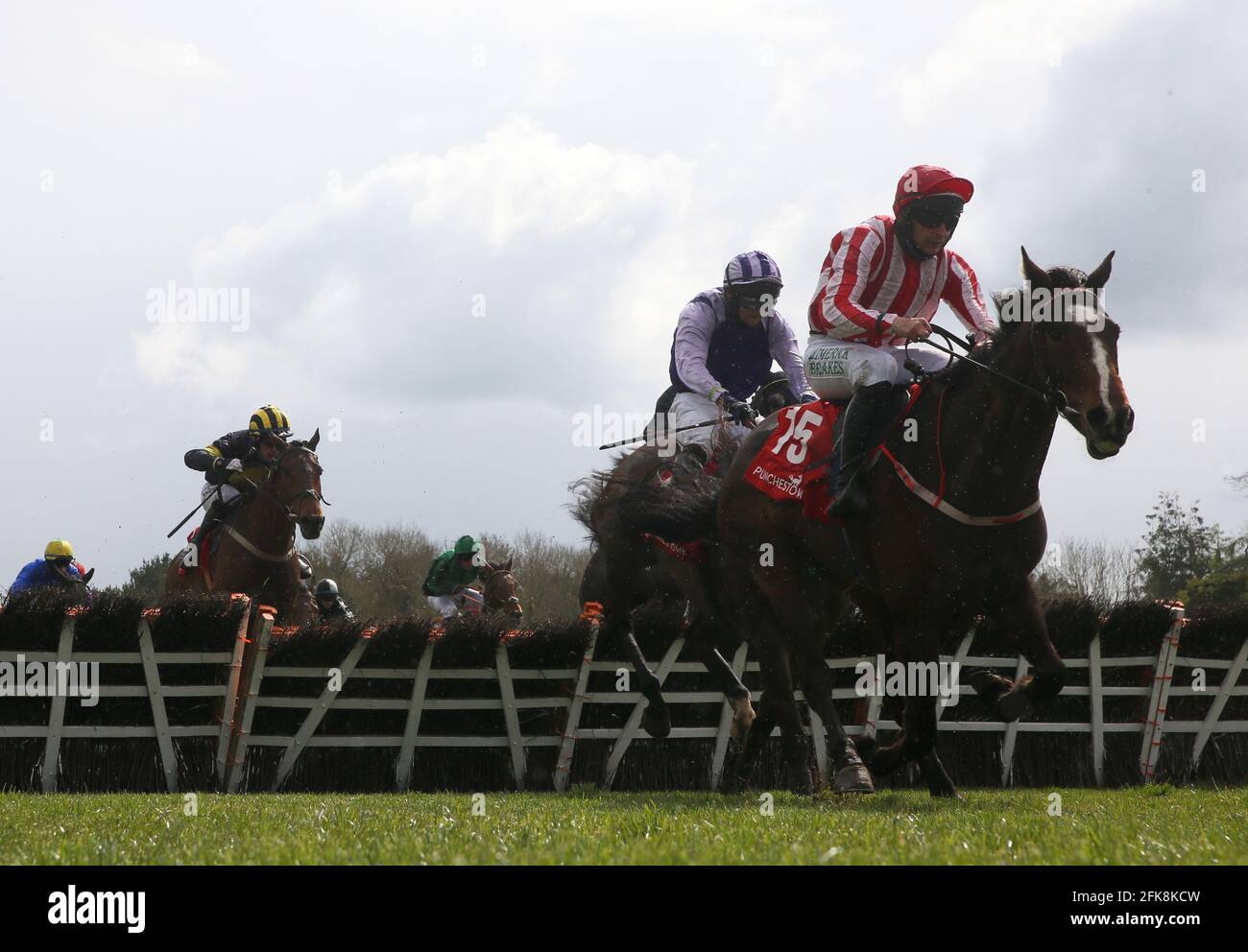 Cathal Landers riding Jiving Jerry (right) on their way to winning the Specialist Joinery Group Handicap Hurdle during Day Three of the Punchestown Festival at Punchestown Racecourse in County Kildare, Ireland. Issue date: Thursday April 29, 2021. Stock Photo
