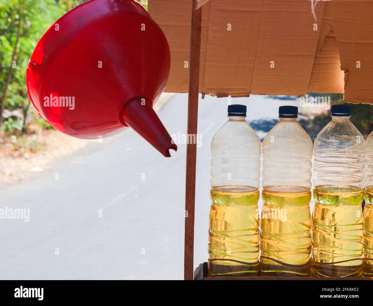 Detail of a stall featuring liters of gasoline for cars, scooters. The