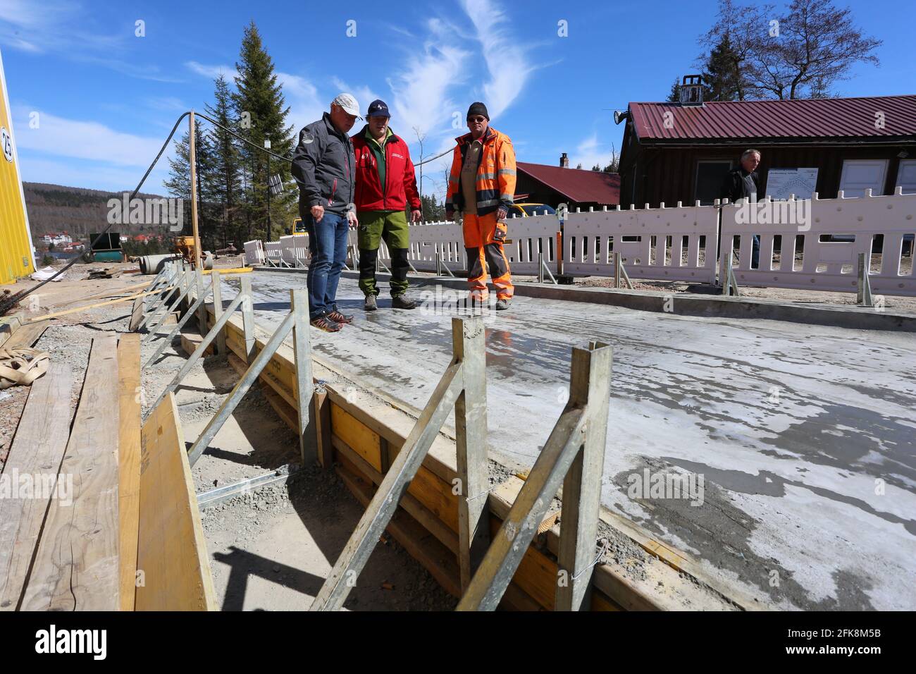 Schierke, Germany. 27th Apr, 2021. Construction meeting at a building site for a new luge track. By autumn 2021, a historic track that has existed since 1969 will be extensively renovated here below the Brocken. Around 780000 euros will be invested in the 330-metre-long bobsleigh and luge track, which will later also be used all year round. Children and young people will then be able to train here again under the most modern conditions. Credit: Matthias Bein/dpa-Zentralbild/ZB/dpa/Alamy Live News Stock Photo