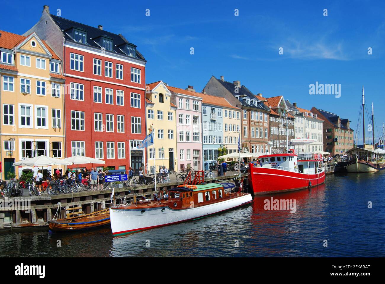 Copenhagen, Denmark. - Along the canals with the characteristic colored houses. Stock Photo