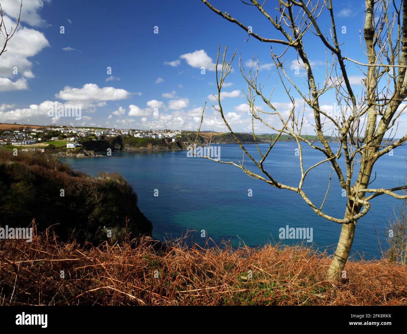 Mevagissey seen from Chapel Point, Portmellon, Cornwall, on an early