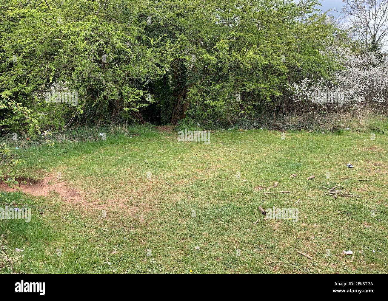 The clearing in the park known locally as The Mounds in Kings Norton, Birmingham, where a baby, who has since been named George by those looking after him in hospital, was discovered clothed and wrapped in a blanket by a dog walker. Picture date: Thursday April 29, 2021. Stock Photo