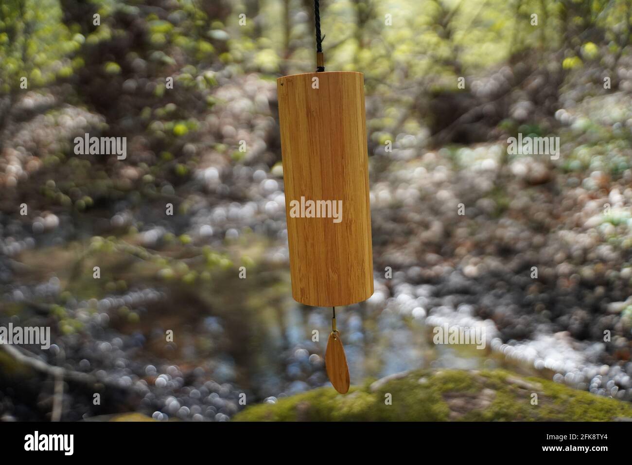 Koshi wind chimes outside in the forest for sound healing therapy, yoga and meditation, relax