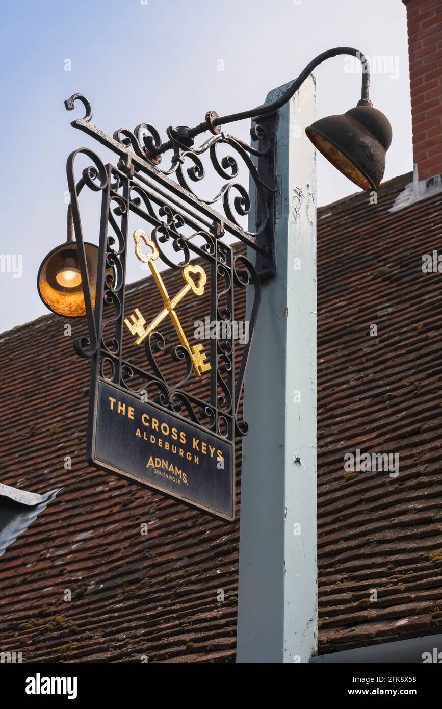 Aldeburgh pub, view of the vintage sign hanging over the entrance to The Cross Keys Inn pub sited along the seafront in Aldeburgh, Suffolk, England UK Stock Photo