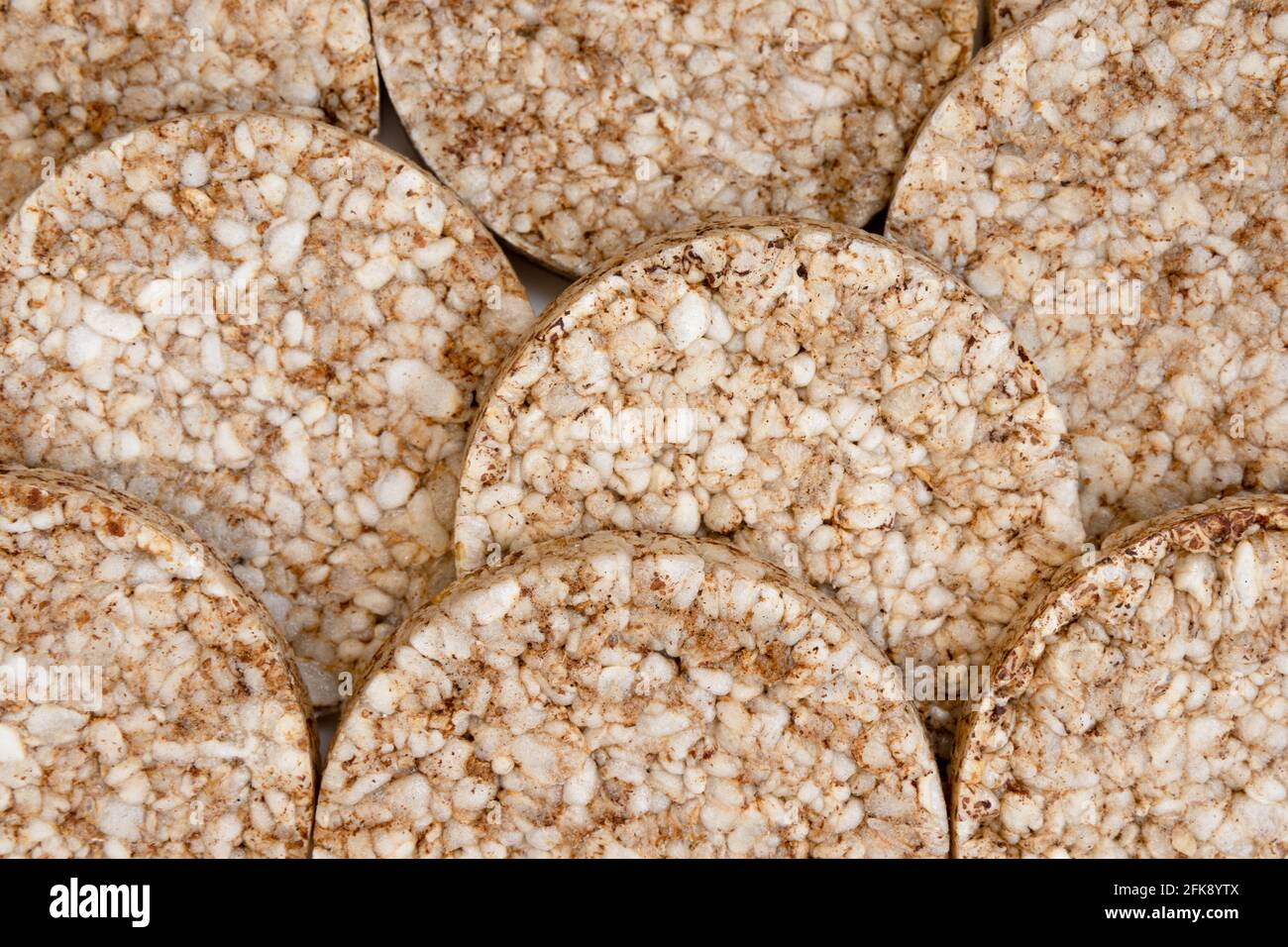 background of puffed rice cakes, flat lay, top view, crunchy rice waffle, close up Stock Photo
