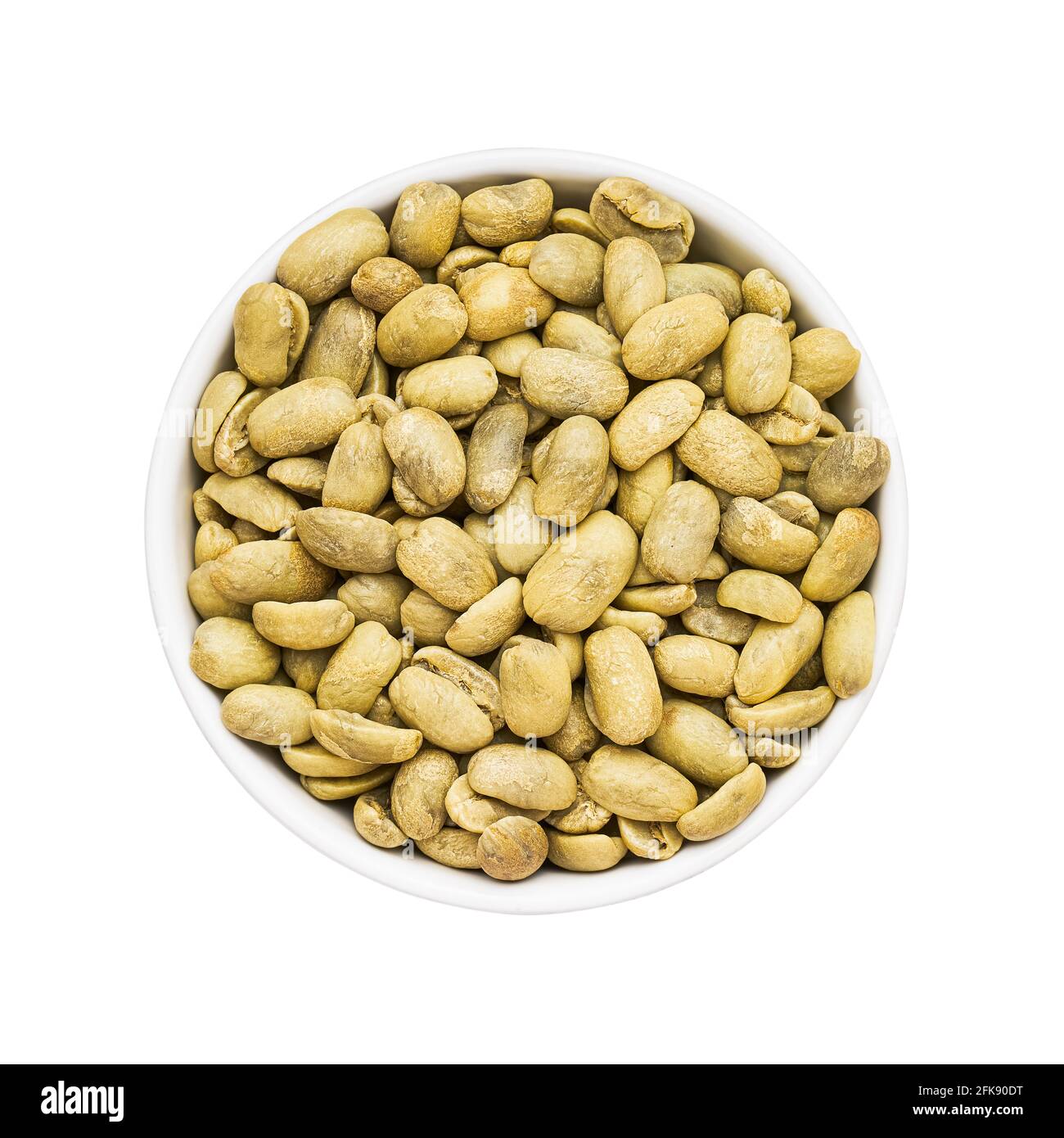 Green coffee beans in a bowl isolated on white background with a clipping path. Top view Stock Photo