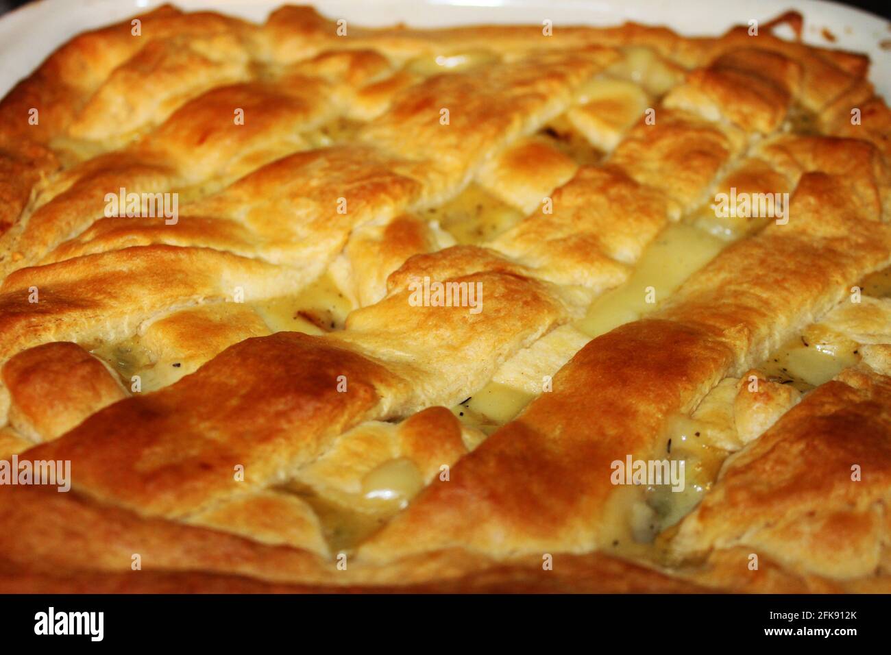 Close-up of a homemade chicken pot pie in a baking dish. Stock Photo