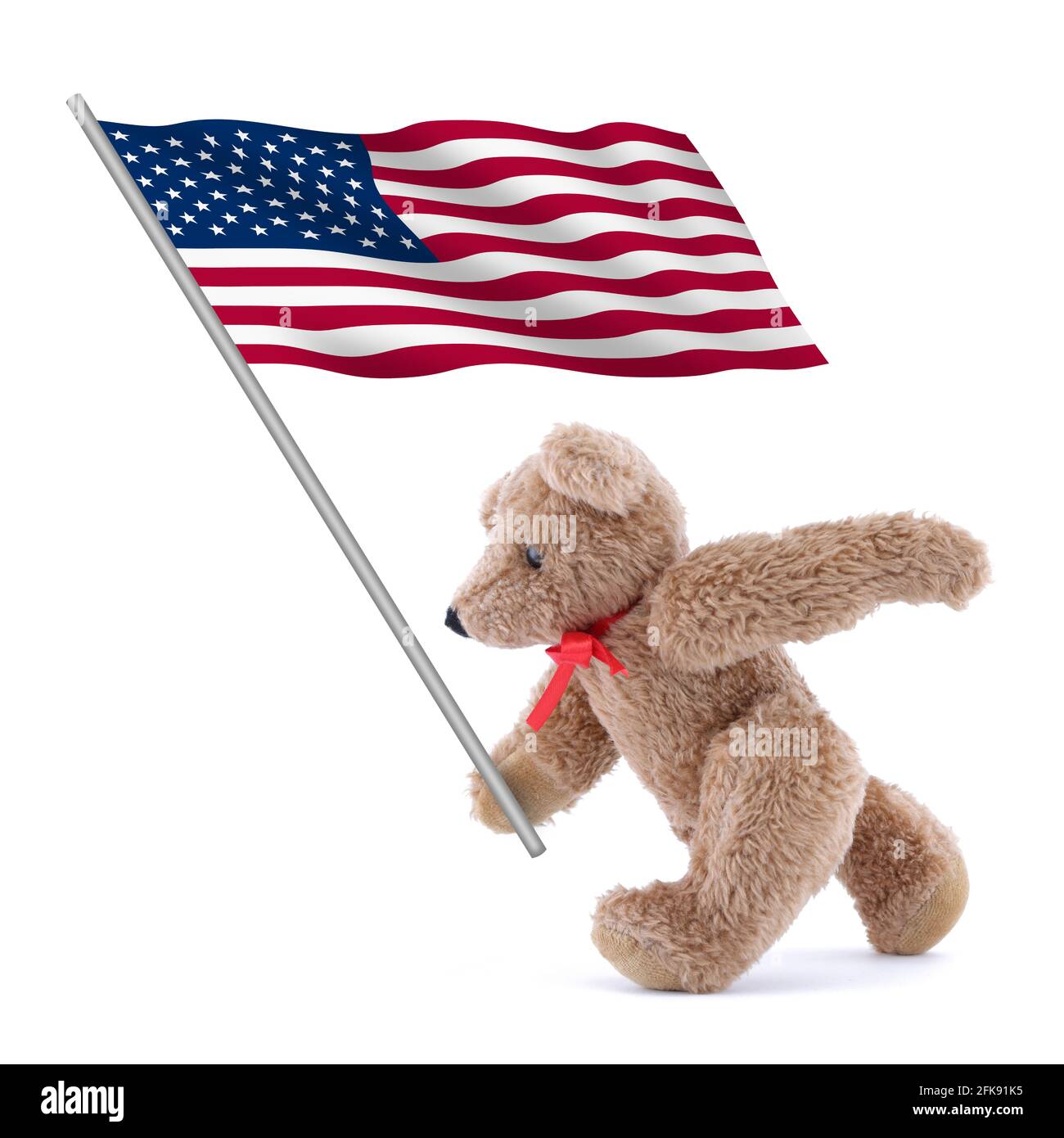 United states of America flag stars and stripes old glory being carried by a cute teddy bear Stock Photo