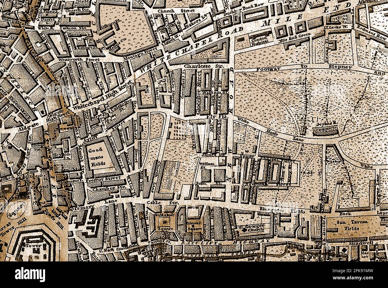 A very early part map of the streets of London England and its features including Whitechapel road, sun tavern fields,Goodmans fields,Mile End,green,Whitechapel high street,aldgate,tower of london,tower hill, Bluegates fields,Petticoat Lane, St Georges Church, White Horse Lane, Wentworth Street, Redmans Row, London Hospital, Mile End, Charlotte Street, Montagu Street, Ducking Pond row, Brick Lane, Bakers Lane,Back Lane, Cable Street, Rosemary Lane, Princes Square Well Close Square, Well Street, Lambert Street , Great Tower Hill, Little Tower Hill, Ratclife highway, Pennington Street, etc Stock Photo