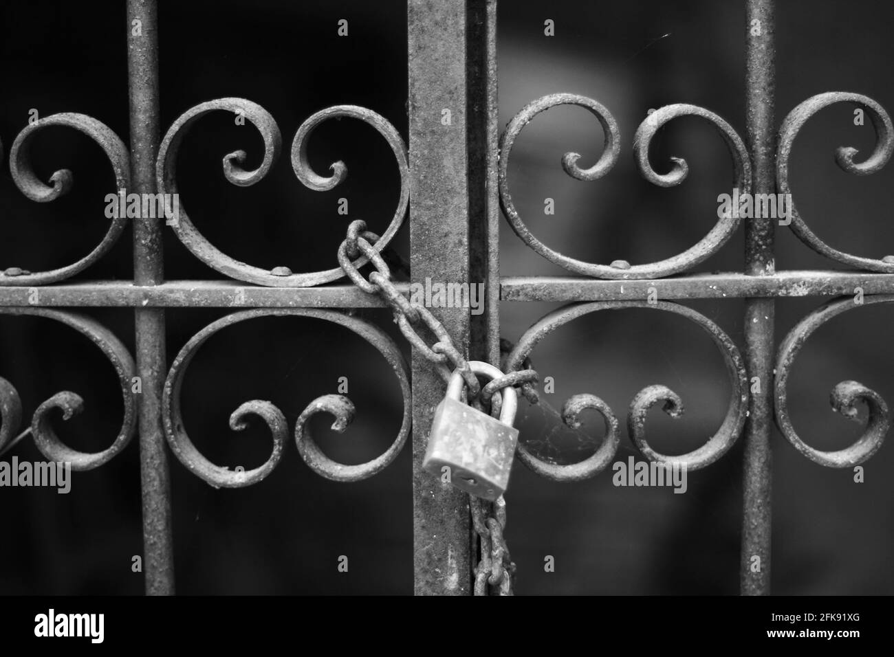 Wrought iron gate lock hi-res stock photography and images - Alamy