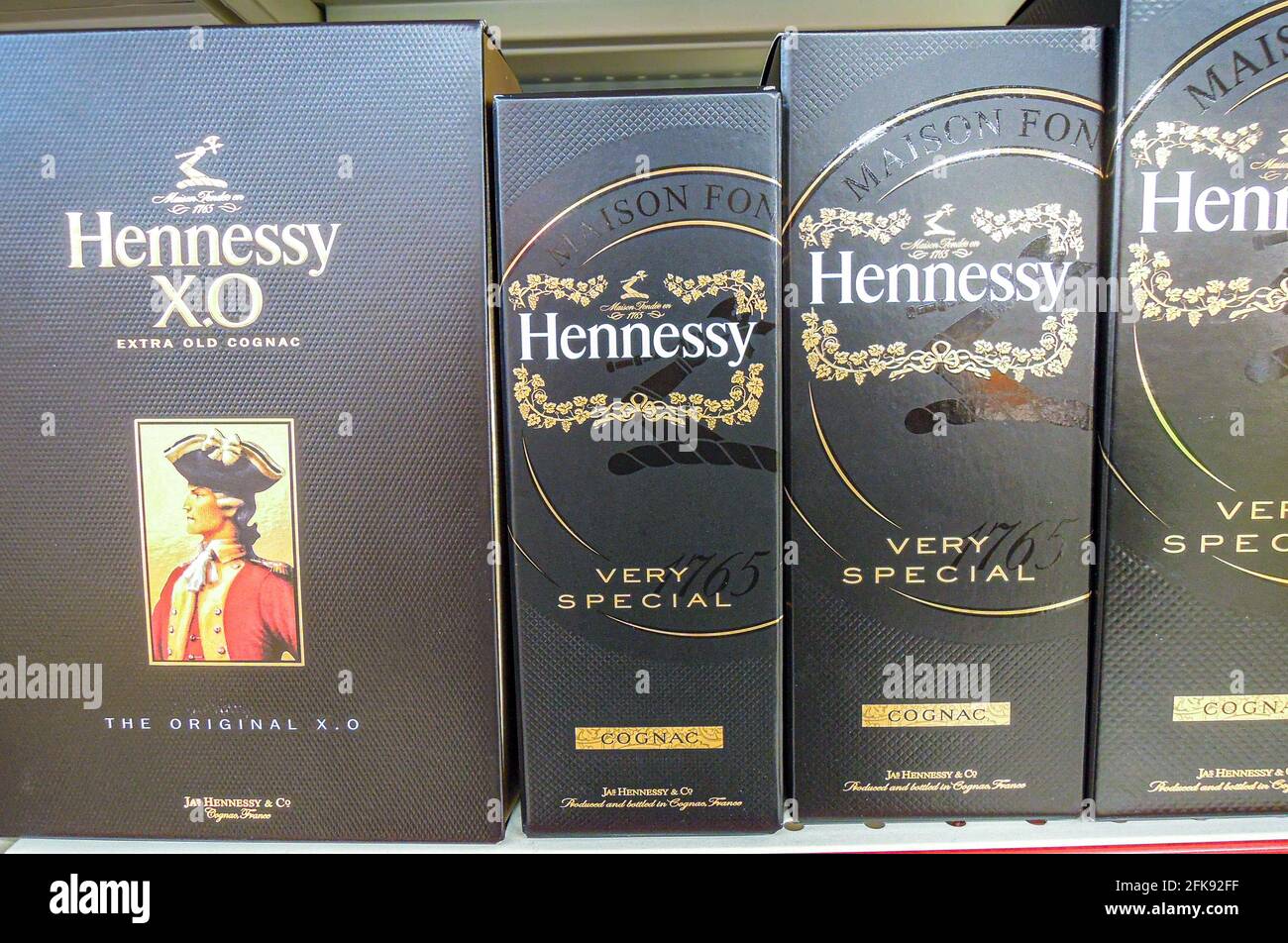 Samara, Russia - March 21, 2020: Hennessy cognac ready for sale on the shelves in supermarket. Various bottled alcoholic beverages Stock Photo