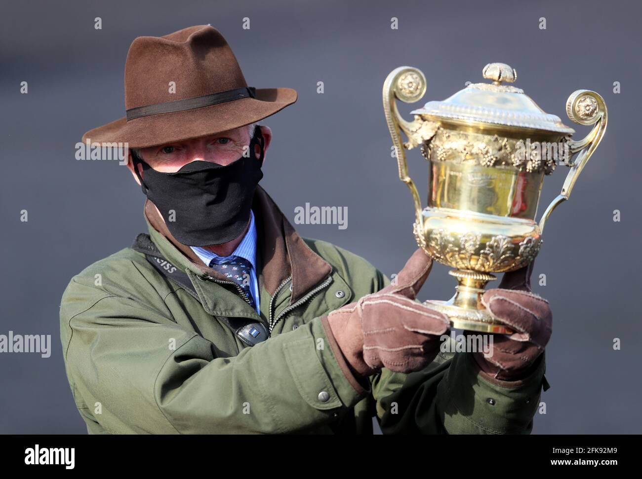 William Mullins, trainer of Klassical Dream celebrates winning the Ladbrokes Champion Stayers Hurdle trophy during Day Three of the Punchestown Festival at Punchestown Racecourse in County Kildare, Ireland. Issue date: Thursday April 29, 2021. Stock Photo