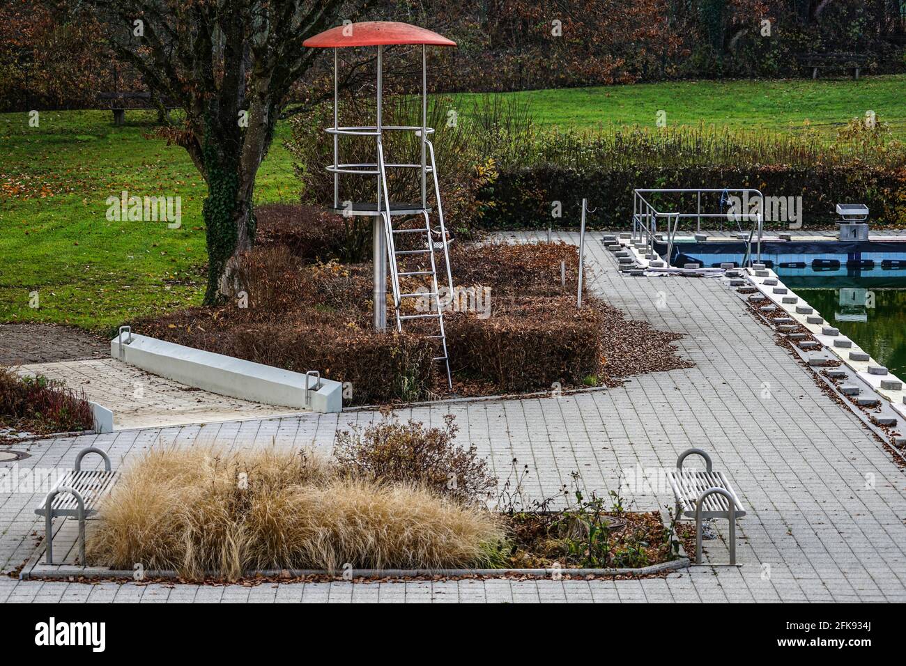 Lifeguard observation tower in an outdoor swimming pool. Stock Photo