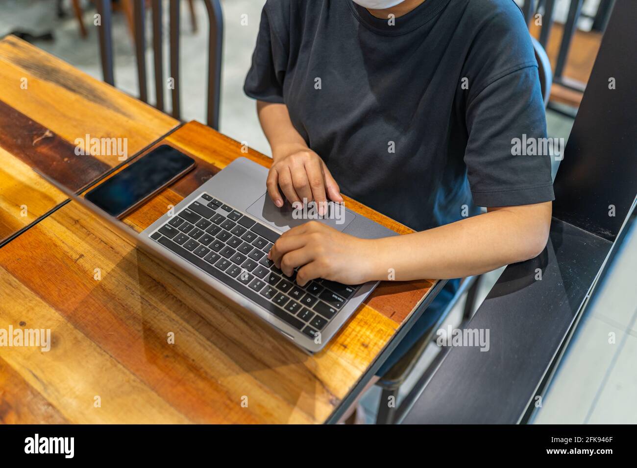 High angle view of female working or studying on laptop Stock Photo
