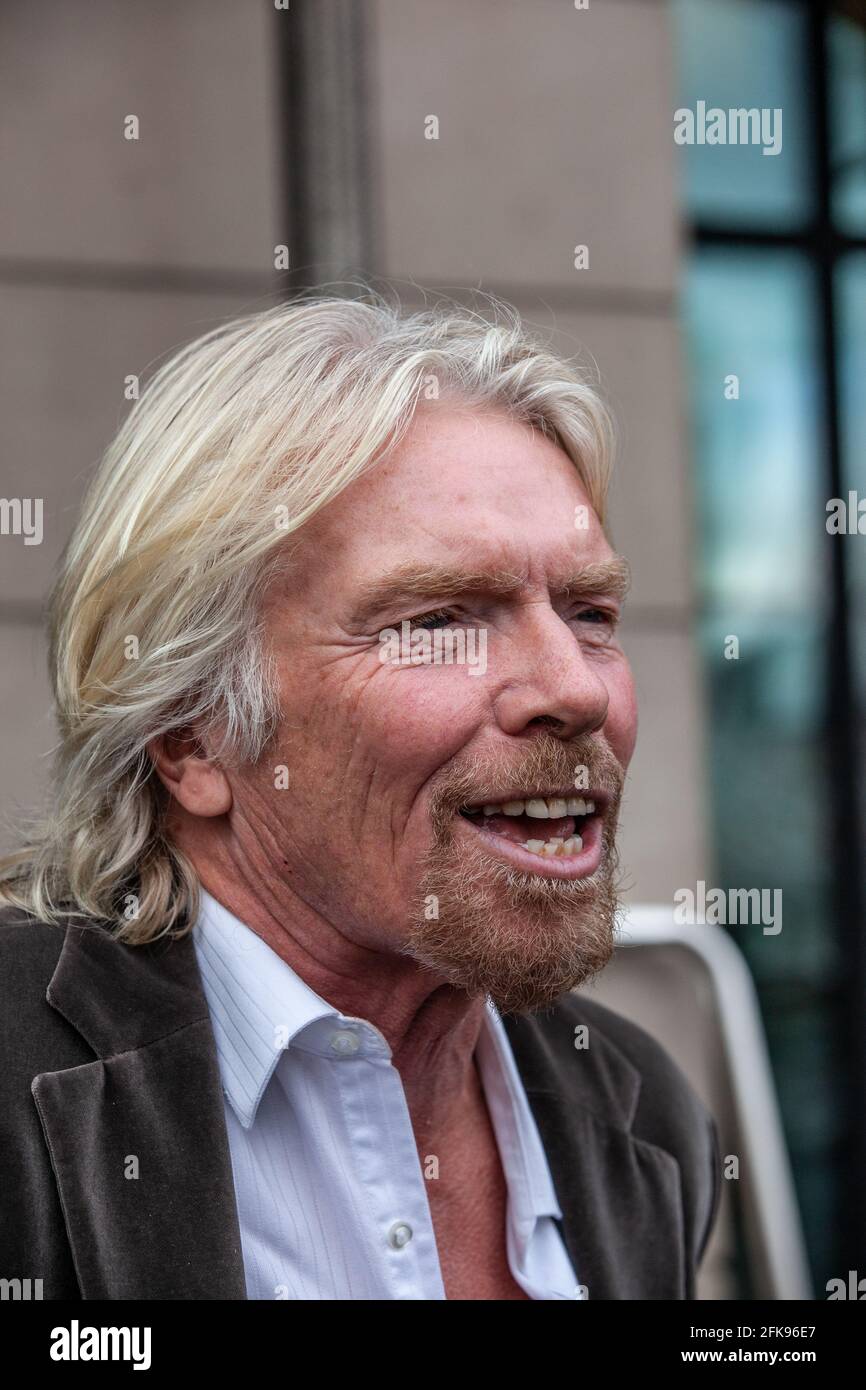 Sir Richard Branson, Chairman of Virgin Group at Portcullis House to be questioned by The Transport Select Committee about the West Coast train line. Stock Photo