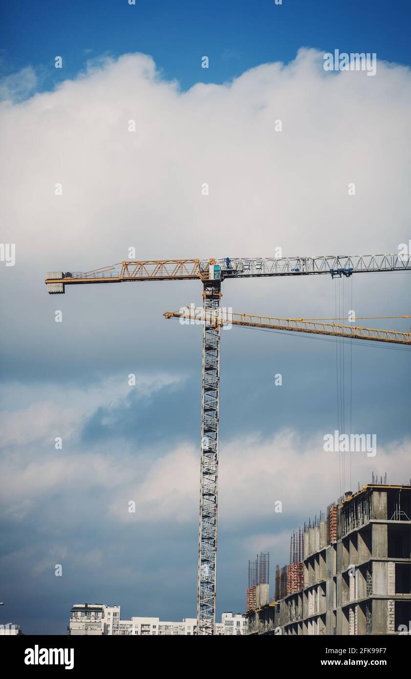 tower cranes against the sky. construction site Stock Photo - Alamy