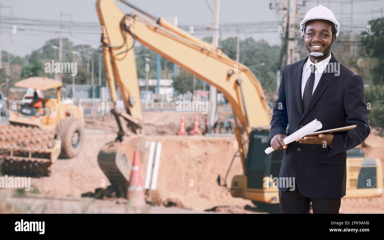 African engineers manager control the road rebuilding and inspect the ...
