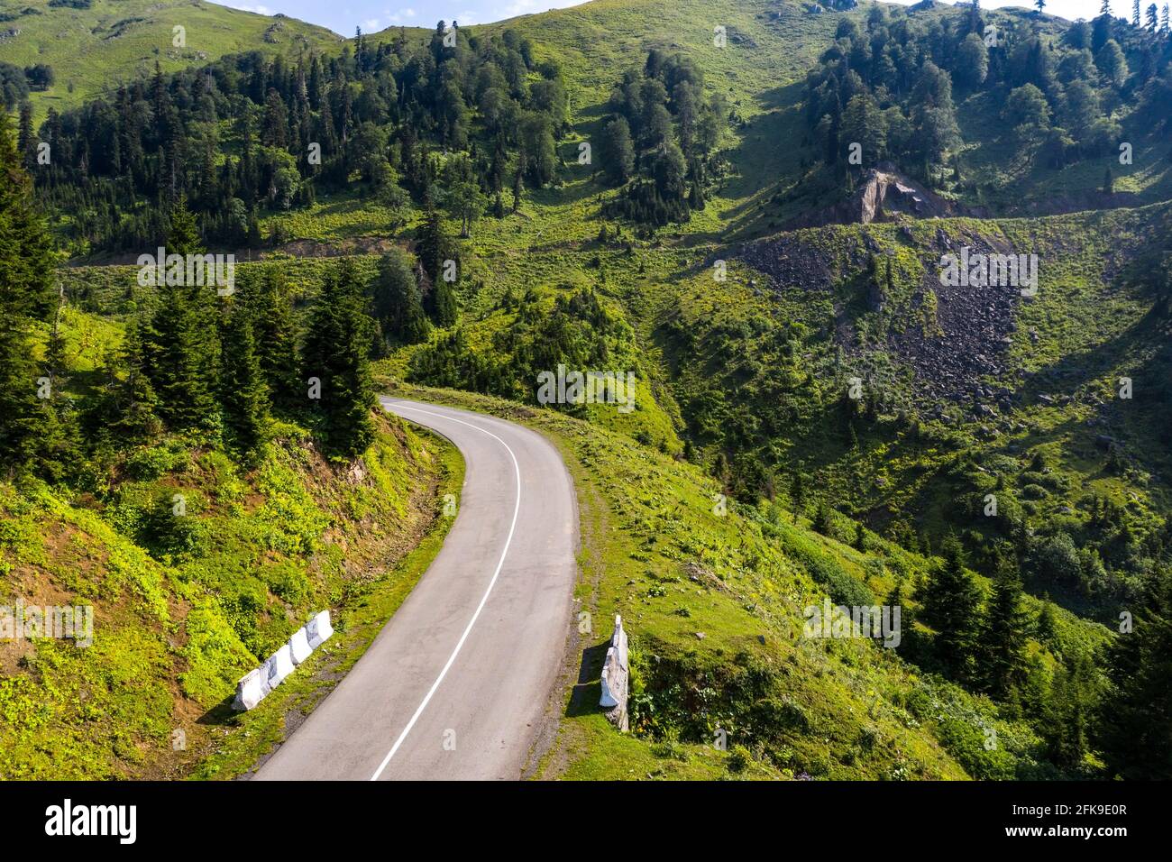 Asphalt road among the forest view from the drone Stock Photo - Alamy