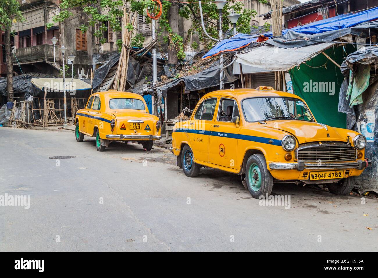 KOLKATA, INDIA - OCTOBER 31, 2016: View of yellow Hindustan Ambassador taxis in Kolkata, India Stock Photo