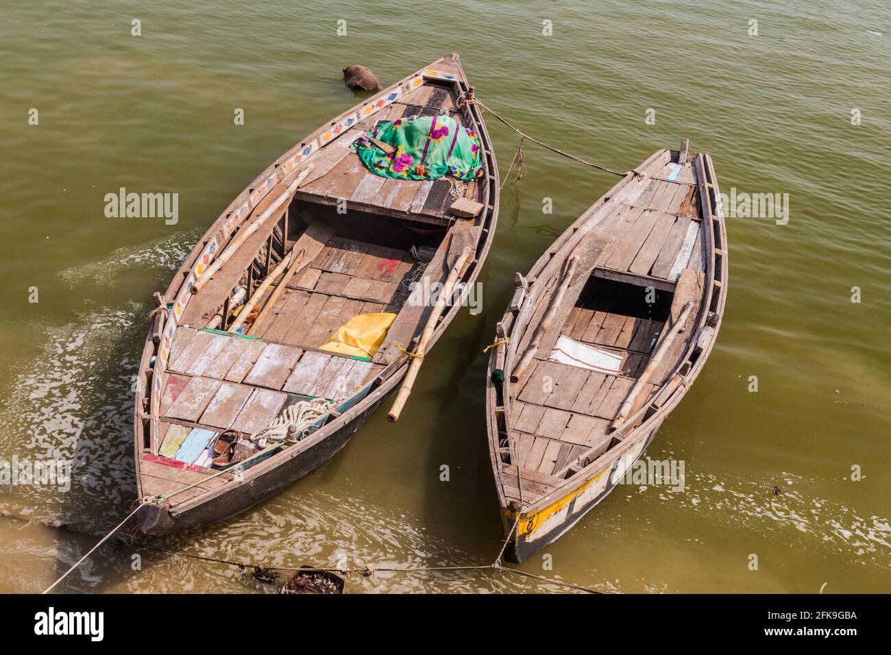 Small boats at river Ganges in Varanasi, India Stock Photo