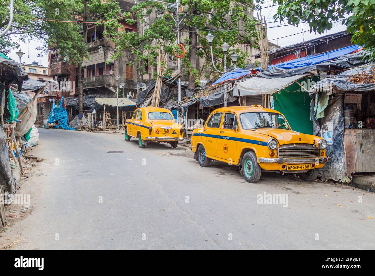 KOLKATA, INDIA - OCTOBER 31, 2016: View of yellow Hindustan Ambassador taxis in Kolkata, India Stock Photo