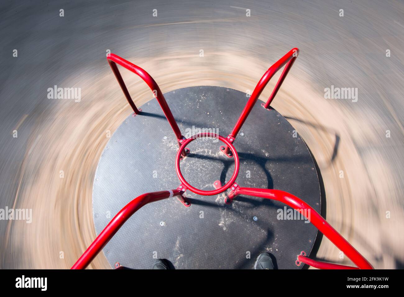 small merry-go-round in a playground. Stock Photo