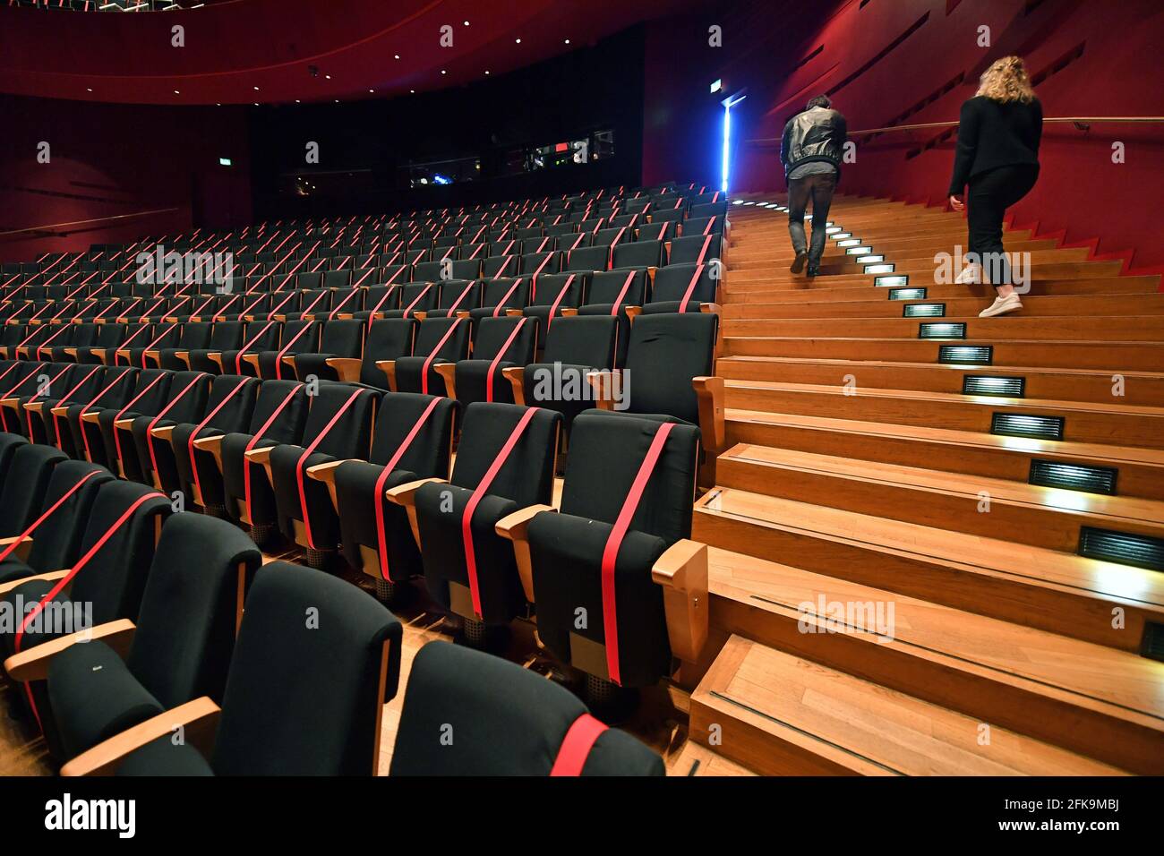 Erfurt, Germany. 28th Apr, 2021. Many seats are blocked due to infection control in the auditorium of the Theater Erfurt. Credit: Martin Schutt/dpa-Zentralbild/ZB/dpa/Alamy Live News Stock Photo
