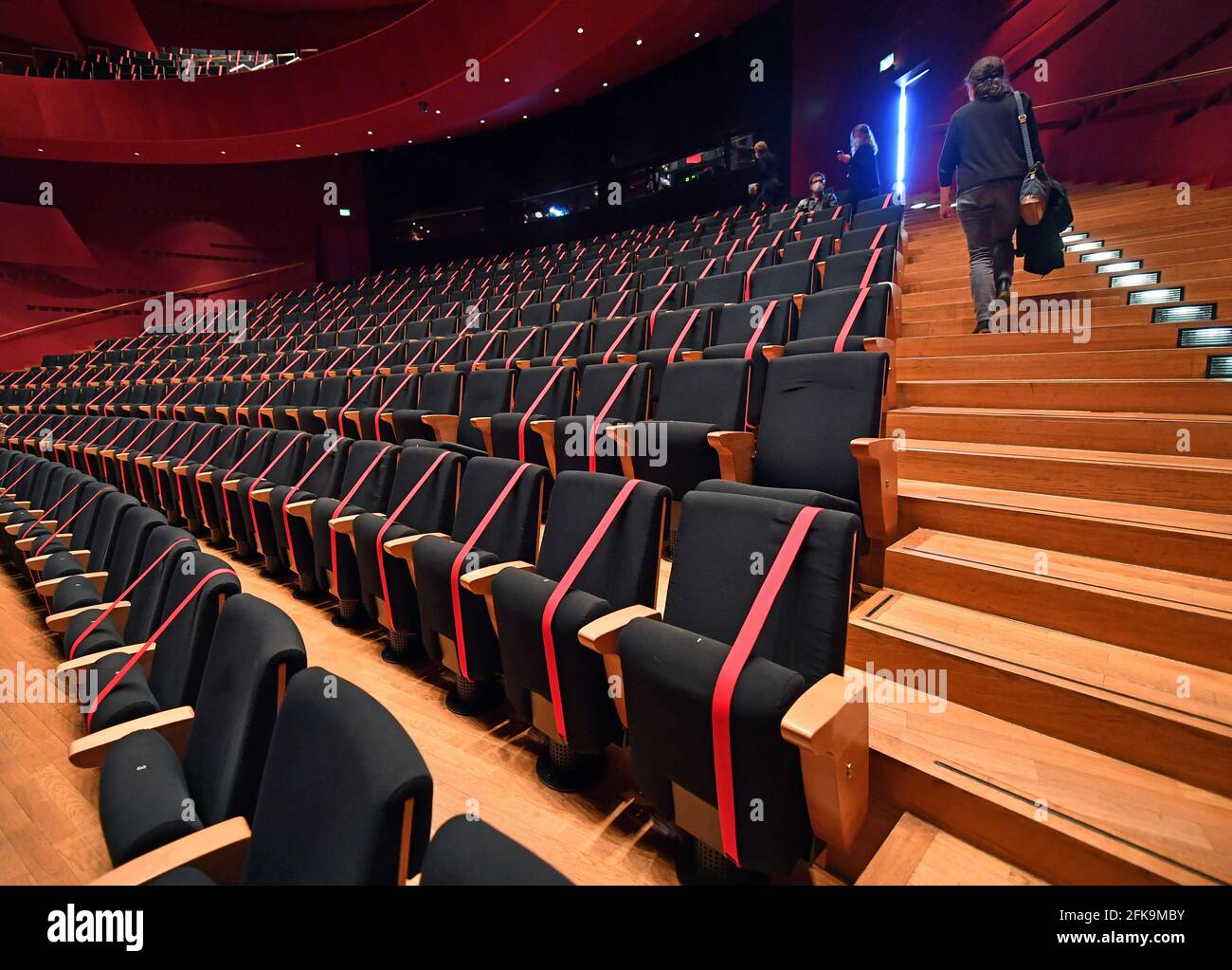 Erfurt, Germany. 28th Apr, 2021. Many seats are blocked due to infection control in the auditorium of the Theater Erfurt. Credit: Martin Schutt/dpa-Zentralbild/ZB/dpa/Alamy Live News Stock Photo
