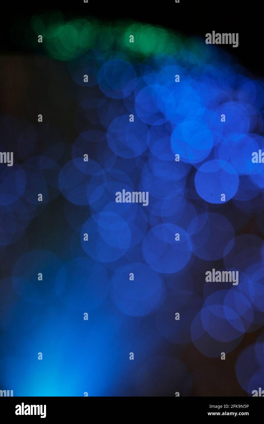 Vertical background of blue and green bokeh lights Stock Photo - Alamy