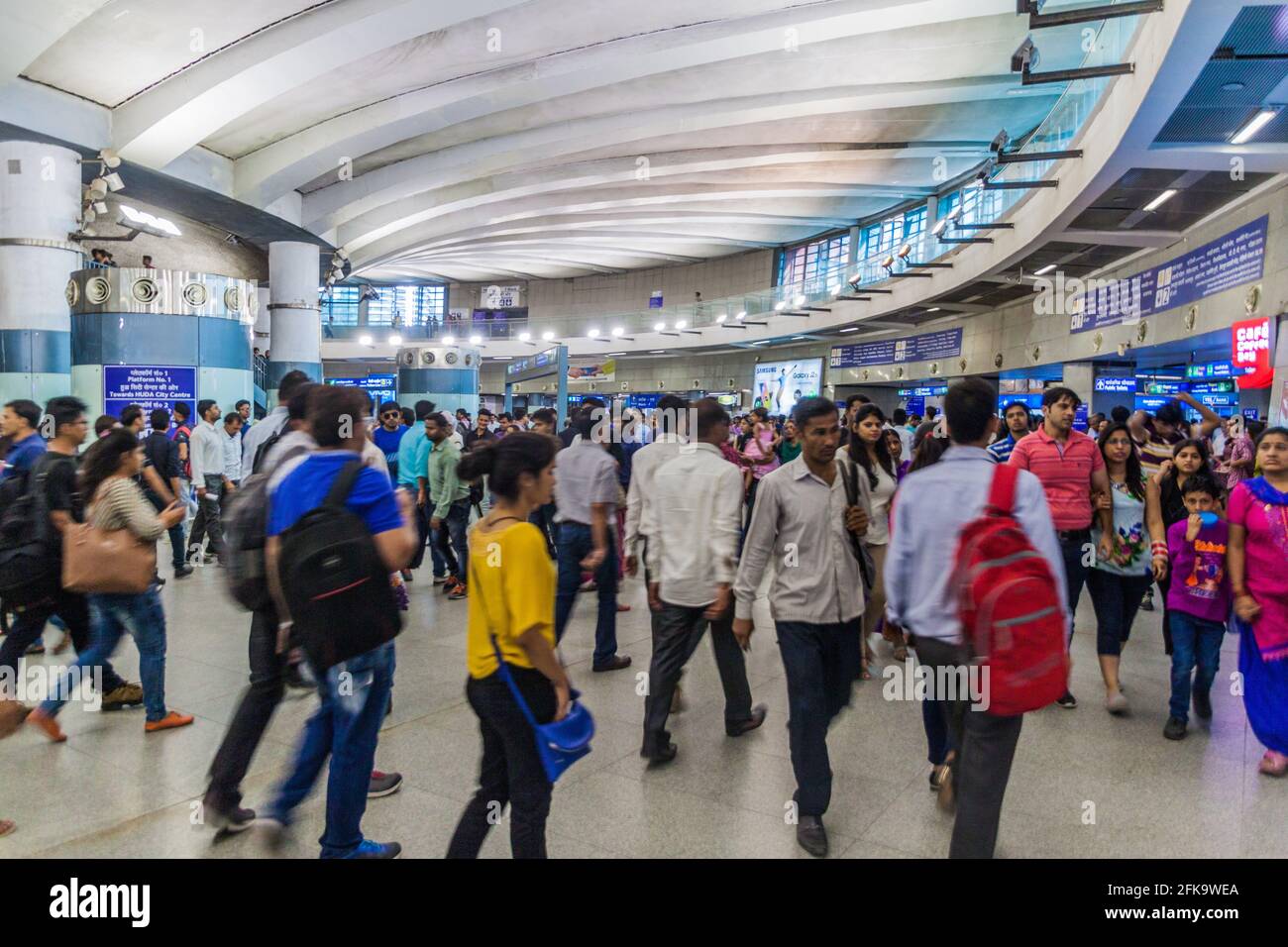 DELHI, INDIA - OCTOBER 22, 2016: Commuters in Rajiv Chowk metro station in the center of Delhi, India. Stock Photo