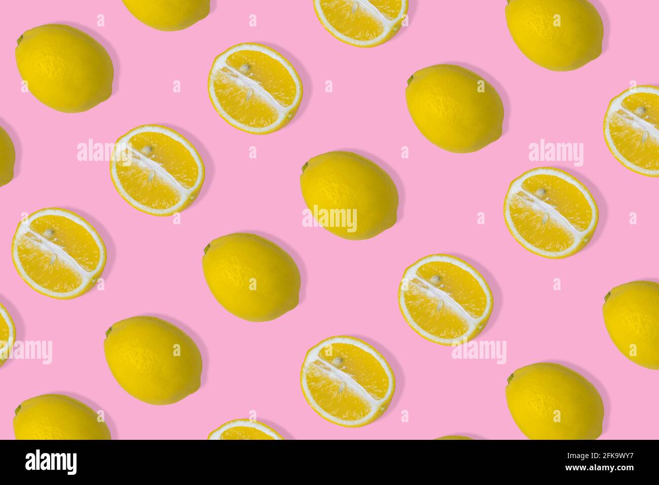 Trendy summer pattern with yellow lemon slice on bright pink background ...