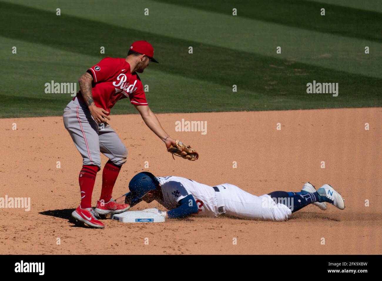 Los Angeles Dodgers first baseman Matt Beaty (45) steals second base during a MLB game against the Los Angeles Dodgers, Wednesday, April 28, 2021, in Stock Photo