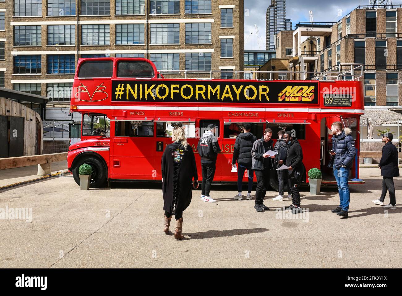 London, UK. 15 April 2021. Niko for mayor bus on Brick Lane. Niko Omilana  is a candidate for Mayor of London. Credit: Waldemar Sikora Stock Photo -  Alamy