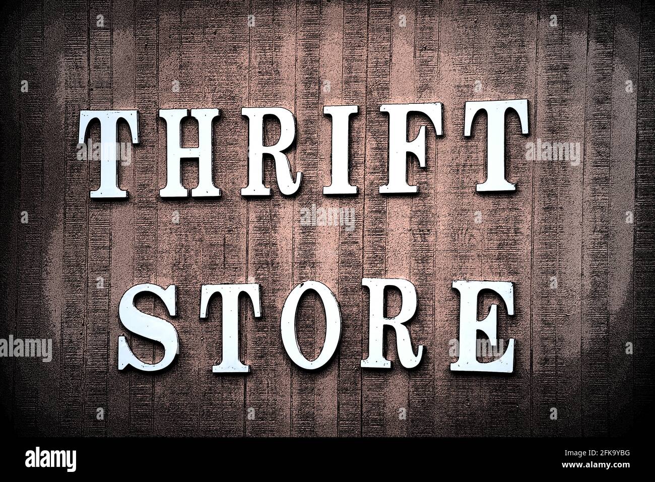 Graphic illustration shows a sign for thrift store. It has a rustic