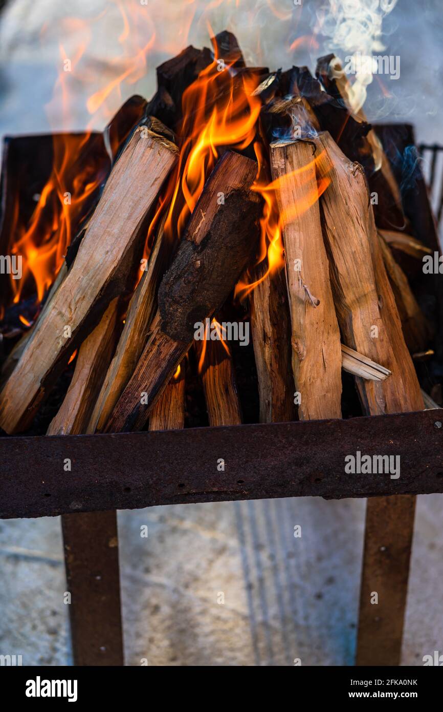 Burning wood chips to form coal. Barbecue preparation, fire before