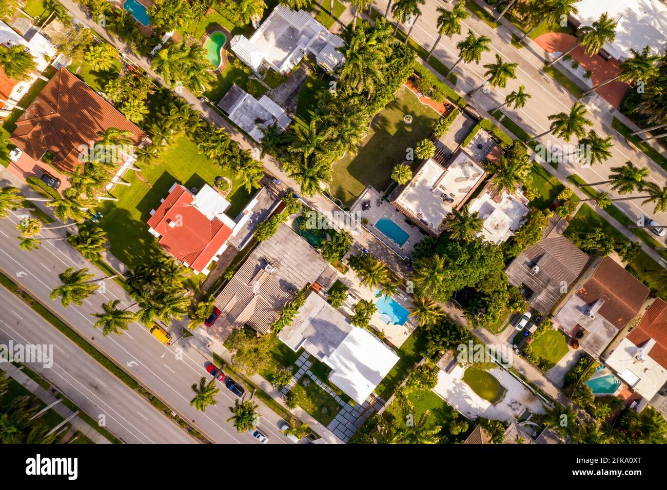 Aerial photo of upscale residential houses with swimming pools