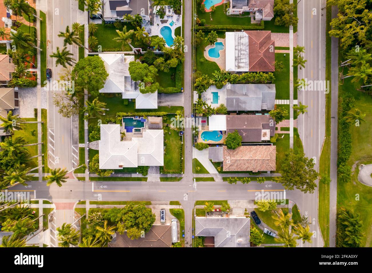 Aerial photo of upscale residential houses with swimming pools