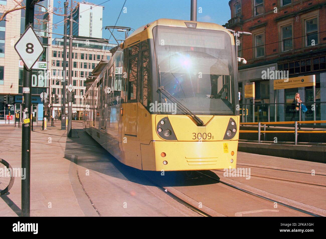 Manchester, UK - 3 April 2021: A Manchester Metrolink tram (Bombardier M5000, no. 3009) at St Peter's Square. Stock Photo
