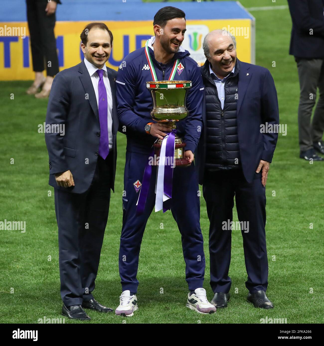 Parma, Italy, 28th April 2021. Joseph B Comisso, Alberto Aquilani Head coach of ACF Fiorentina and Rocco B Comisso Chariman of ACF Fiorentina pose with the trophy following the 2-1 victory in the Primavera Coppa Italia match at Stadio Ennio Tardini, Parma. Picture credit should read: Jonathan Moscrop / Sportimage Stock Photo