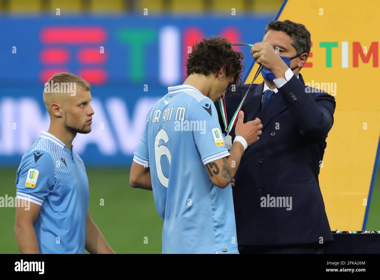 Parma, Italy, 28th April 2021. Romano Floriani Mussolini of SS Lazio receives his runners' up medal from Luigi De Siervo Managing Director of Lega Serie A during the presentation trophy ceremony of the Primavera Coppa Italia match at Stadio Ennio Tardini, Parma. Picture credit should read: Jonathan Moscrop / Sportimage Stock Photo