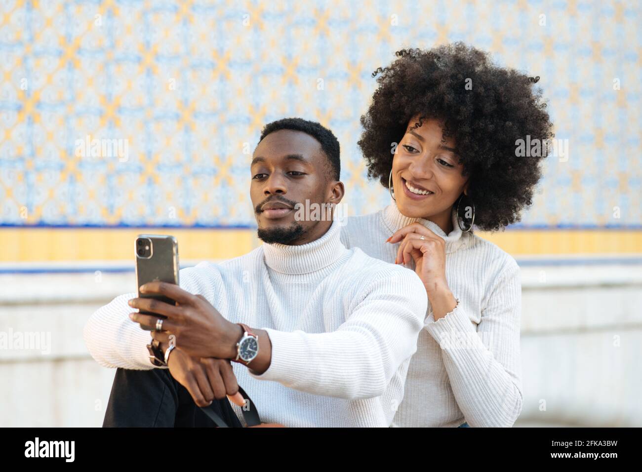 black and handsome couple taking a selfie Stock Photo