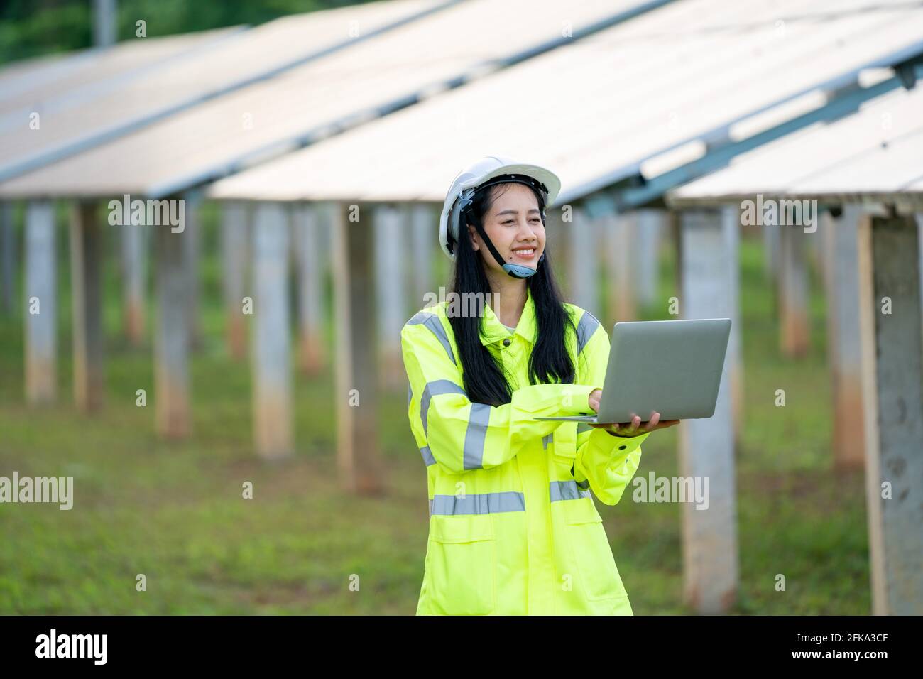 Engineer women wearing safety vest and 