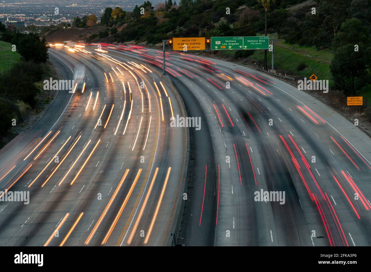 Motion blurred car lights at dusk along Interstate 405, Los Ange Stock Photo