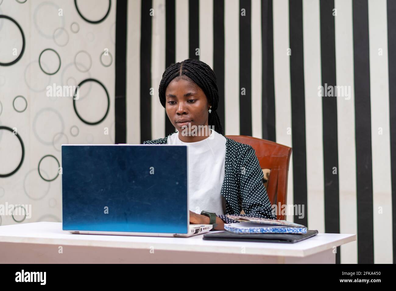 African businesswoman working in the office Stock Photo - Alamy