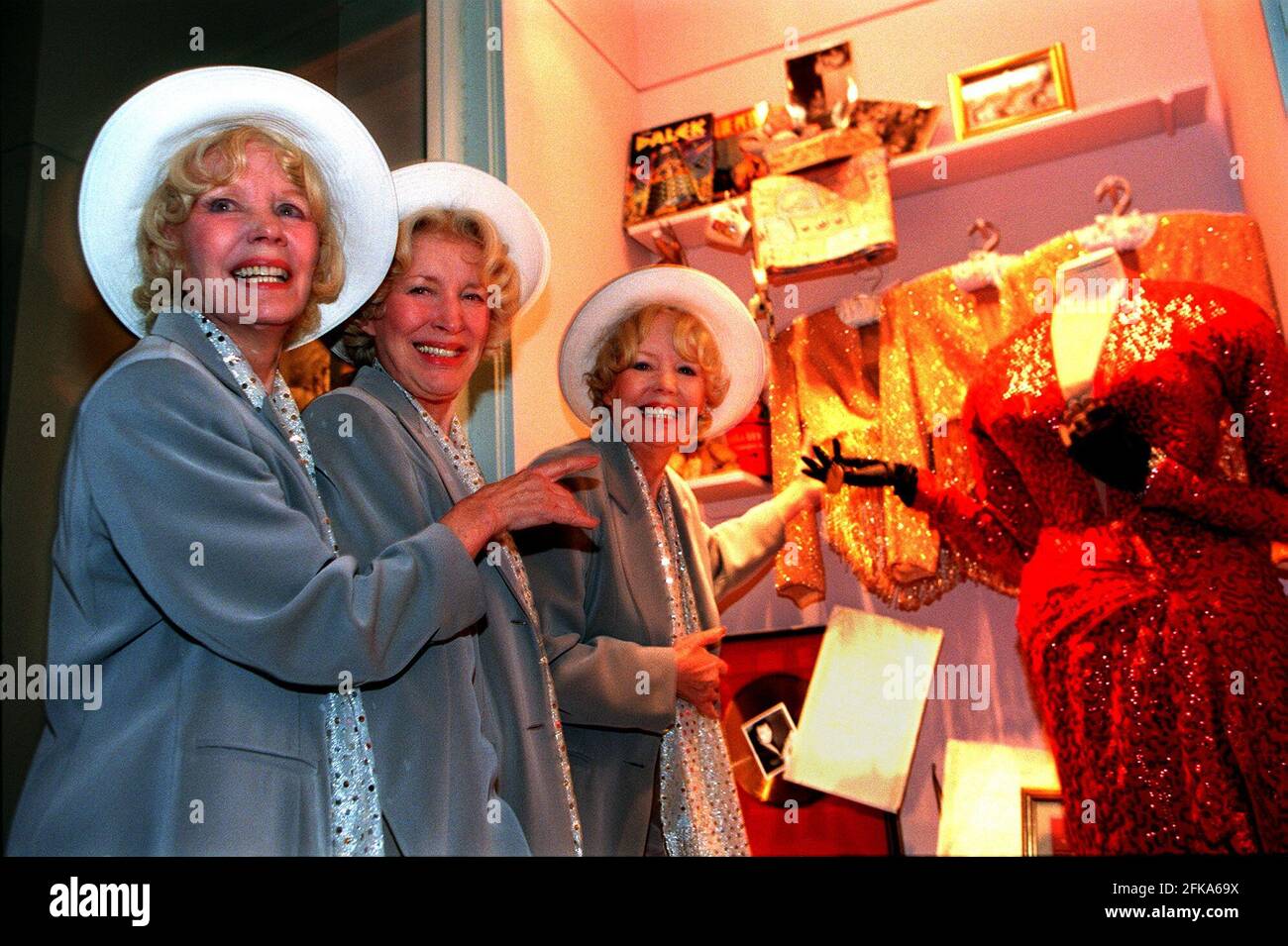 The Beverley Sisiter March 1999at the Imperial War Museum  with one of the exhibits  From the Bomb to the Beatles exhibition containing costumes and dress worn by Marilyn Monroe in the film  Gentleman perfer Blondes Stock Photo