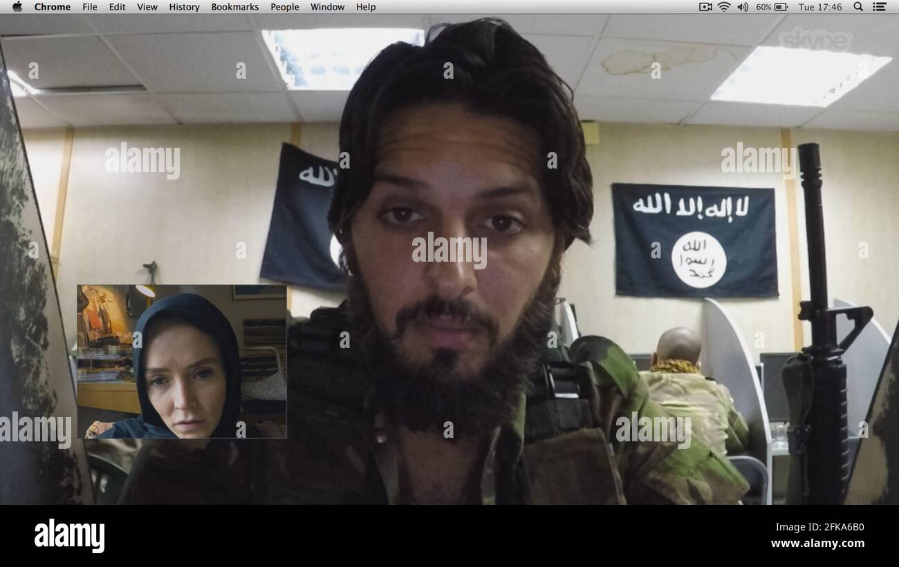 RELEASE DATE: May 14, 2021 TITLE: Profile STUDIO: Focus Features DIRECTOR: Timur Bekmambetov PLOT: An undercover British journalist infiltrates the online propaganda channels of the so-called Islamic State, only to be sucked in by her recruiter. STARRING: VALENE KANE as Amy, SHAZAD LATIF as Abu Bilel Al-Britani. (Credit Image: © Focus Features/Entertainment Pictures) Stock Photo